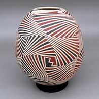 Polychrome jar with a geometric design
 by Rodrigo Perez of Mata Ortiz and Casas Grandes