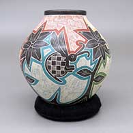Polychrome jar with a sgraffito and painted bee, flower, and geometric design, click or tap to see a larger version