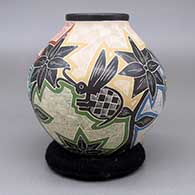 Polychrome jar with a sgraffito and painted bee, flower, and geometric design, click or tap to see a larger version