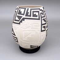 Black-on-buff jar with a sgraffito and painted quail and geometric design
 by Claudia Ledezma Loya of Mata Ortiz and Casas Grandes