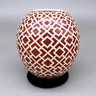 Red jar with a sgraffito geometric design
 by Leonel Lopez Jr of Mata Ortiz and Casas Grandes