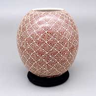 Red jar with a sgraffito geometric design
 by Leonel Lopez Jr of Mata Ortiz and Casas Grandes