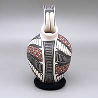 Polychrome wedding vase-style jar with a cuadrillos and geometric design, click or tap to see a larger version