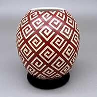 Red jar with a sgraffito geometric design
 by Leonel Lopez Jr of Mata Ortiz and Casas Grandes