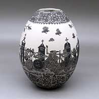 A black-on-white jar decorated with a band of sgraffito Day of the Dead at the Cemetery design with bands of sgraffito geometric design above and below
 by Hector Javier Martinez of Mata Ortiz and Casas Grandes