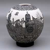 A black-and-white jar decorated with a band of sgraffito Day of the Dead at the Cemetery design between two bands of geometric design
 by Hector Javier Martinez of Mata Ortiz and Casas Grandes