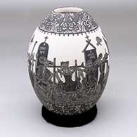 A black-and-white jar decorated with a sgraffito Day of the Dead at the cemetery and geometric design
 by Hector Javier Martinez of Mata Ortiz and Casas Grandes