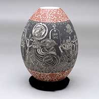 A polychrome jar decorated with a sgraffito Night of the Dead and geometric design
 by Hector Javier Martinez of Mata Ortiz and Casas Grandes