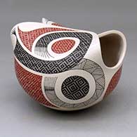 A polychrome folded jar decorated with a cuadrillos-based geometric design
 by Elias Pena of Mata Ortiz and Casas Grandes