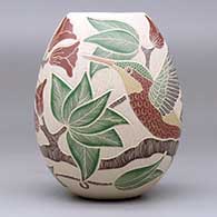 A polychrome jar decorated with a sgraffito-and-painted hummingbird, branch, leaf and flower design, click or tap to see a larger version