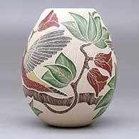 A polychrome jar decorated with a sgraffito-and-painted hummingbird, branch, leaf and flower design, click or tap to see a larger version