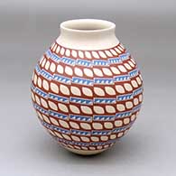 A polychrome jar decorated with painted bands of geometric design
 by Faby Veloz of Mata Ortiz and Casas Grandes