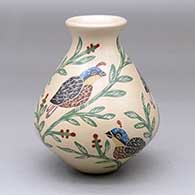 A small polychrome vase decorated with a three-panel sgraffito-and-painted quail, branch and leaf design
 by Carlos Corona of Mata Ortiz and Casas Grandes