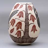 A polychrome jar decorated with a sgraffito-and-painted roadrunner, plant, leaf and flower design, click or tap to see a larger version