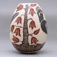 A polychrome jar decorated with a sgraffito-and-painted roadrunner, plant, leaf and flower design, click or tap to see a larger version