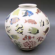 A polychrome jar with a flared lip and decorated with a lightly-carved and sgraffito tropical fish and coral reef design
 by Adrian Corona of Mata Ortiz and Casas Grandes