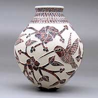 A polychrome jar decorated with a hummingbird, vine, flower and geometric design, click or tap to see a larger version