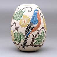A polychrome jar decorated with a sgraffito and painted bird, branch, leaf and flower design, click or tap to see a larger version
