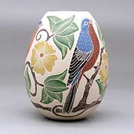 A polychrome jar decorated with a sgraffito and painted bird, branch, leaf and flower design, click or tap to see a larger version