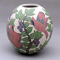 Click for a larger view A polychrome jar decorated with a sgraffito-and-painted bird, branch, leaf and berry design
by Blanca Arras of Mata Ortiz and Casas Grandes