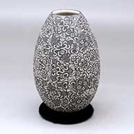 A black and white jar decorated with a sgraffito geometric design
 by Gabriela Perez de Martinez of Mata Ortiz and Casas Grandes