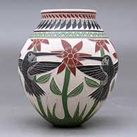 A polychrome jar decorated with a sgraffito and painted hummingbird, flower, leaf, branch and geometric design, click or tap to see a larger version
