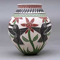 A polychrome jar decorated with a sgraffito and painted hummingbird, flower, leaf, branch and geometric design, click or tap to see a larger version