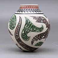 A polychrome jar decorated with a sgraffito and painted parrot, dragonfly, serpent and geometric design, click or tap to see a larger version