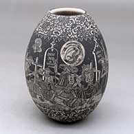 A black on white jar decorated with a sgraffito Night of the Dead at the cemetery and geometric design
 by Hector Javier Martinez of Mata Ortiz and Casas Grandes