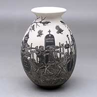 A black on white jar with a rolled lip and decorated with a sgraffito Day of the Dead at the Cemetery design
 by Hector Javier Martinez of Mata Ortiz and Casas Grandes
