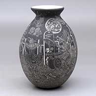 A black on white jar with a rolled lip and decorated with a sgraffito Night of the Dead at the Cemetery design
 by Hector Javier Martinez of Mata Ortiz and Casas Grandes