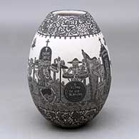 A black on white jar decorated with a sgraffito Day of the Dead at the Cemetery and geometric design
 by Hector Javier Martinez of Mata Ortiz and Casas Grandes