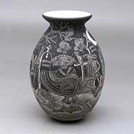A black on white jar with a rolled lip and decorated with a sgraffito Night of the Dead at the Cemetery design
 by Hector Javier Martinez of Mata Ortiz and Casas Grandes