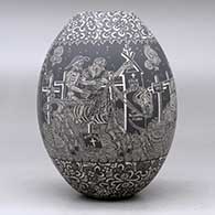 A black on white jar decorated with a sgraffito Night of the Dead at the cemetery and geometric design, click or tap to see a larger version