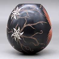 A polychrome jar with a sgraffito and painted hummingbird, vine, flower and geometric design, click or tap to see a larger version