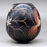 A polychrome jar with a sgraffito and painted hummingbird, vine, flower and geometric design, click or tap to see a larger version