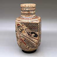 A squarish polychrome mixed-clay jar with an extended neck, decorated with a fish, serpent, rabbit and geometric design
 by Paty Ortiz of Mata Ortiz and Casas Grandes