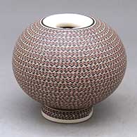 Click for a larger view A polychrome seed pot with an Infinity rim, custom matching stand and decorated with bands of tiny geometric designs
by Karla Lopez Cota of Mata Ortiz and Casas Grandes
