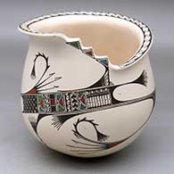 A polychrome jar with a step-cut and flared rim, decorated with a flowing geometric design
 by Angela Corona of Mata Ortiz and Casas Grandes