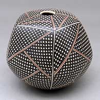 A polychrome pentagonal round bottomed seed pot decorated with a tiny square and geometric design
 by Luz Elva Gutierrez of Mata Ortiz and Casas Grandes