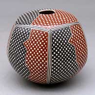 A round-bottomed pentagonal seed pot decorated with a tiny square and geometric design
 by Luz Elva Gutierrez of Mata Ortiz and Casas Grandes