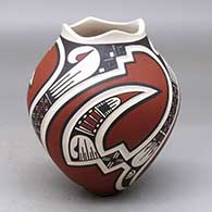 A polychrome jar lightly carved and painted with a three-panel sickle, bird element and geometric design
 by Lazaro Ozuna of Mata Ortiz and Casas Grandes