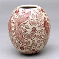 A polychrome jar decorated with a three-panel sgraffito bird, vine, leaf and flower design
 by Abel Lopez of Mata Ortiz and Casas Grandes