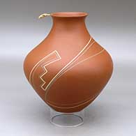 A polychrome jar with a recurved neck and decorated with a geometric design with a hummingbird hovering on the rim
 by Diego Valles of Mata Ortiz and Casas Grandes