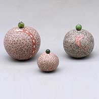 A set of three miniature lidded jars decorated with a serpent, hummingbird, fineline and geometric designs
 by Carla Martinez of Mata Ortiz and Casas Grandes