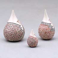 A set of three miniature tear drop jars decorated with a serpent, hummingbird, fineline and geometric designs, click or tap to see a larger version