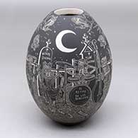 A black on white jar decorated with a sgraffito Night of the Dead at the cemetery design
 by Hector Javier Martinez of Mata Ortiz and Casas Grandes