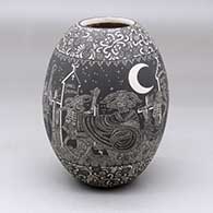 A black on white jar decorated with a sgraffito Night of the Dead at the cemetery and geometric design
 by Hector Javier Martinez of Mata Ortiz and Casas Grandes