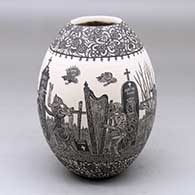 A black on white jar decorated with a sgraffito Day of the Dead at the Cemetery and geometric design
 by Hector Javier Martinez of Mata Ortiz and Casas Grandes