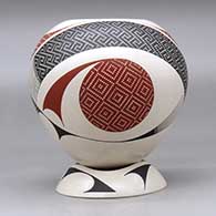 A polychrome jar decorated with a two panel tiny square and geometric design, plus a custom matching stand, click or tap to see a larger version